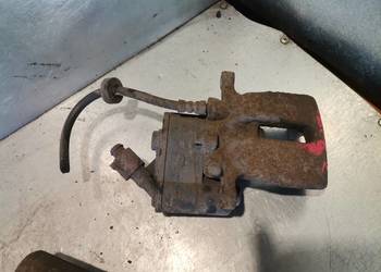 AUDI A6 C6 ZACISK HAMULCOWY LEWY TYŁ