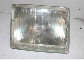 OPEL CORSA A LAMPA REFLEKTOR LEWY ORYGINAŁ  NUMER MAGAZYNOWY