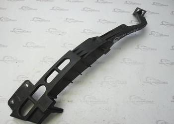 OPEL ASTRA J LIFT 14r ślizg mocowanie pod lampę prawą