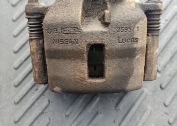 Zacisk hamulcowy jarzmo lewy przód nissan primera P12