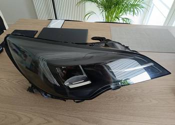 Opel Astra V K lampa prawa przód - 796.52.000.00