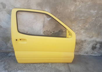 Suzuki Ignis FH 00-03 drzwi przód przedni żółty Z1E przednie
