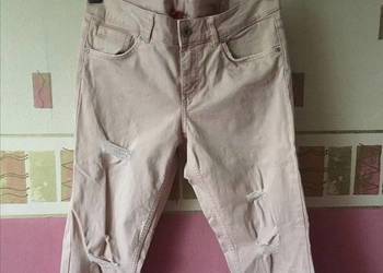 H&M spodnie dżinsowe zEfektem postarzenia Dziury Szarpania. Destroyed jeans