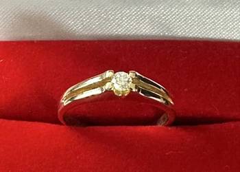 Złoty pierścionek 585 z brylantem roz 12