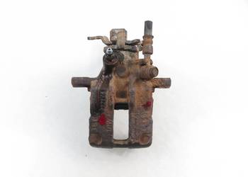 ZACISK LEWY TYŁ NISSAN ALMERA II N16