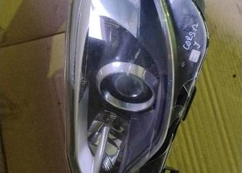 Corsa j reflektor lewy