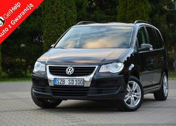 Volkswagen Touran 1.6MPI(102KM)+gaz Lift Klimatronic Duża Navi Kamera Hak … Volkswagen Touran 1.6MPI(102KM)+gaz Lift Klimatronic Duża Navi Kamera Hak …