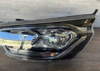 TRANSIT CUSTOM LIFT 17- LAMPA LEWA PRZÓD SOCZEWKA JK21-13W030-DJ