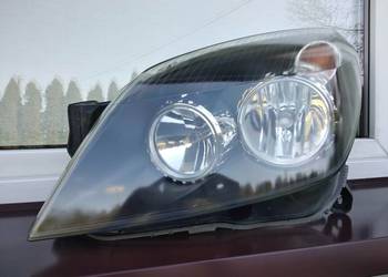 Opel Astra H lampa przednia lewa reflektor przód kierowcy Hella oryginał