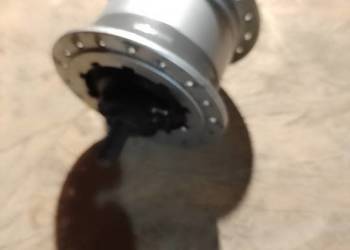 Piasta z prądnicą Shimano rolkowy hamulec