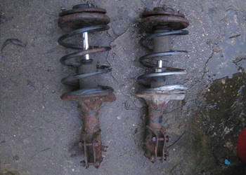 Amortyzator kolumna przednia sprężyna mcpherson Mitsubishi Carisma lift DID