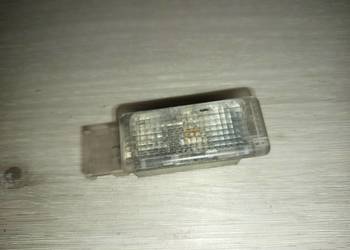 VW Golf V  lampka schowka