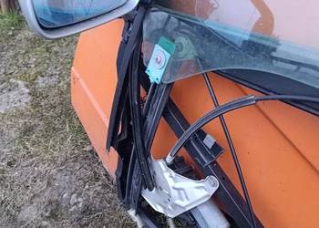 Szyba z ramką i lusterkiem audi A6C5 sefan