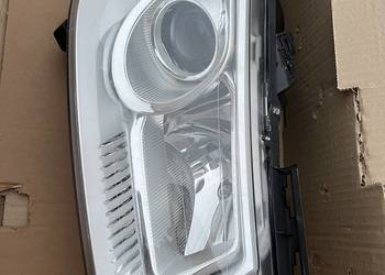 Reflektor RENAULT 7701063220 lub 260103726R