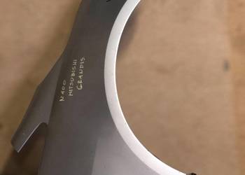 BŁOTNIK PRZEDNI PRAWY MITSUBISHI GRANDIS