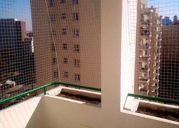 Siatka dla kotów na balkon montaż BEZINWAZYJNY Warszawa Montaż Siatek Kot