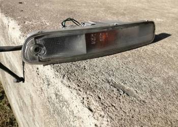 Lampa pozycja kierunek lewy przód Mazda 323F BA