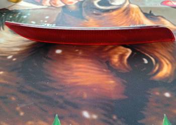 BMW F10 odblask zderzaka tył lewy 7203237