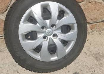 Sprzedam opony z felgami i kołpakami 185/65 R15 4x100