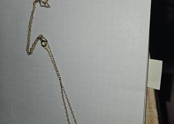 Złoty łańcuszek z medalikiem. Próba 750.