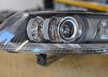 Reflektory bi xenon skrętny Audi A6 C6 przed lift HELLA D2S