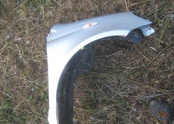 Błotnik przedni prawy Toyota Yaris I 99-06 srebrny