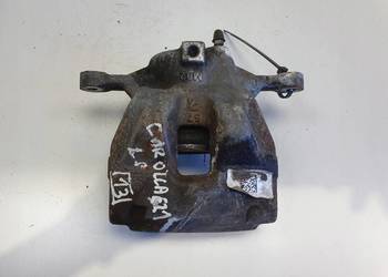 Toyota Corolla XII E21 PRZEDNI ZACISK HAMULCOWY lewy przód KIEROWCY L.P