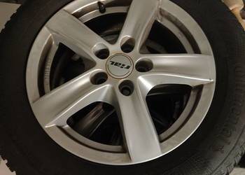 Felgi aluminiowe VW 15" 5x100 z oponami zimowymi Continental 195/65.