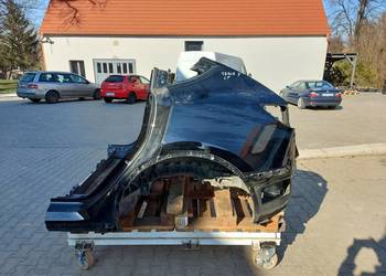 TESLA MODEL Y 2022r ĆWIARTKA BŁOTNIK LEWY TYŁ czarny PBSB