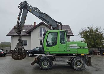 Koparka kołowa Liebherr A 316 Litronic chwytak podpory pług