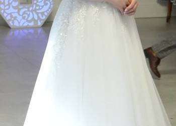 Suknia ślubna typu A - pięknie zdobiona