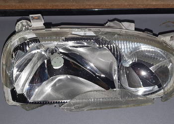 Reflektor prawy Golf 3 III Hella 139174-00R rozbite szkło