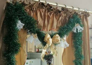 Girlanda świąteczna oświetlona z dzwoneczkami.