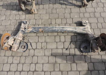 BELKA TYŁ TYLNA OŚ RENAULT LAGUNA 2 FL HB