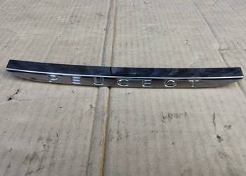 Znaczek logo emblemat atrapy grila peugeot 208 lift 1609868X