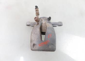 ZACISK LEWY TYŁ TOYOTA AVENSIS II T25