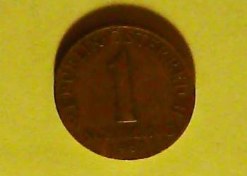 Moneta, 1 austriacki szyling z 1967 r., na rewersie szarotki
