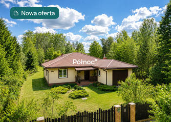 Dom z 35-arową działką i 3 garażami