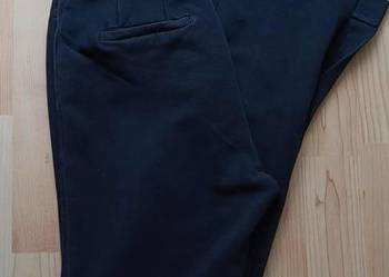 Spodnie r.34 z rozciętymi nogawkami Massimo Dutti