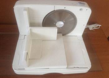 Elektryczna krajalnica do chleba, wędlin, sera, warzyw, owoców