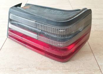 Mercedes W124 sedan lampa prawy tył ciemna Hella