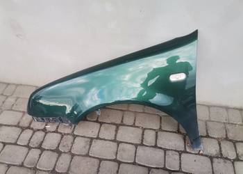 VW BORA BŁOTNIK LEWY PRZÓD PRZEDNI LC6M