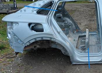 VW ID4 11A , 2024r SUV 5D ĆWIARTKA BŁOTNIK PRAWY TYŁ SZARY LC7A