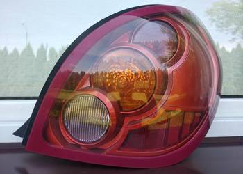 Nissan Almera N16 LIFT FL lampa tył tylna prawa wkład oryginał Hella