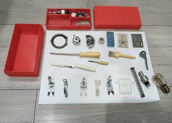 maszyna do szycia łucznik sam przybornik akcesoria stopki igły bębenki