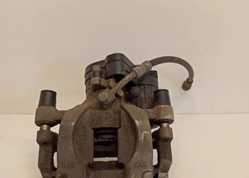 TIGUAN II ALLSPACE ZACISK LEWY TYŁ 5QN615405E 5QN615405