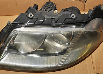Reflektor lewy VW Passat B5 OE 3B0941015AN EUROPA