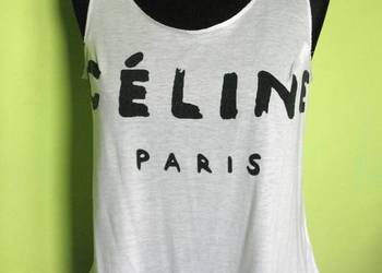 Letnia bluzka z nadrukiem . Uszyta z dzianiny cienkiej,  nieco rozciągliwej