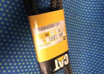 Pasek klinowy o długości 1168 mm z surową krawędzią i kolcami CAT 9M-1091