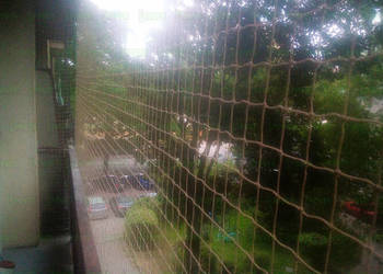 Kocia siatka Warszawa Montaż Siatki Na Balkon Dla Kota Przeciw Ptakom